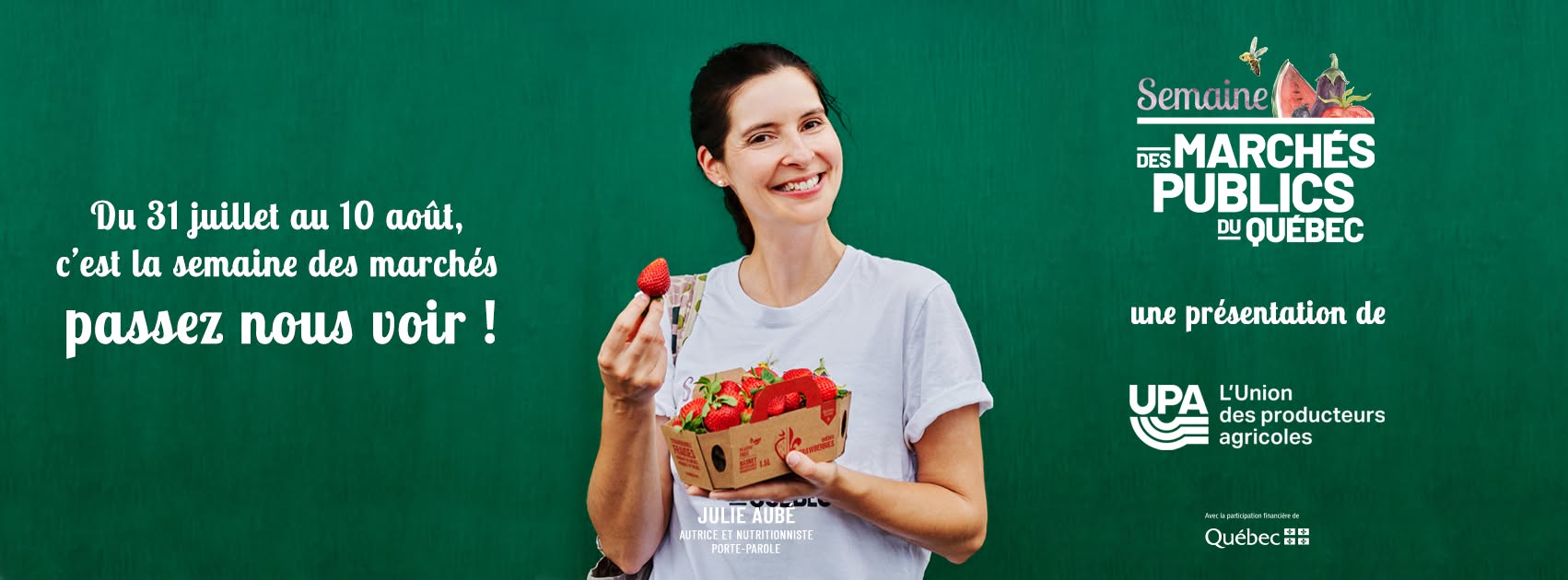 image d'une femme tenant des fraises.